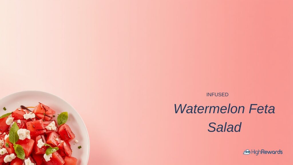 Watermelon feta salad on a plate with a warm pink gradient backdrop